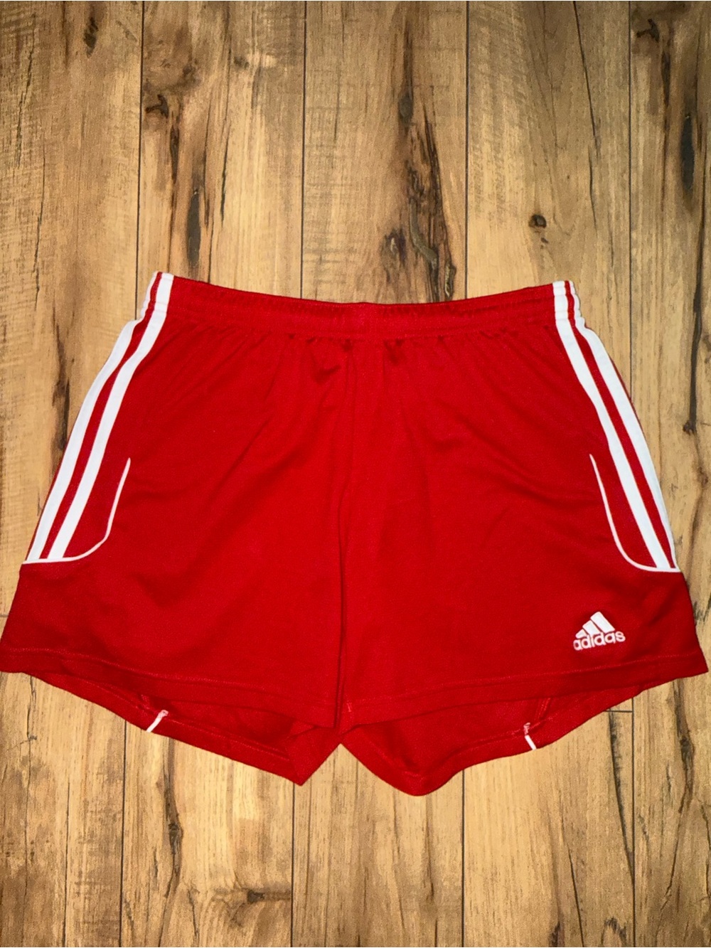 Red adidas shorts